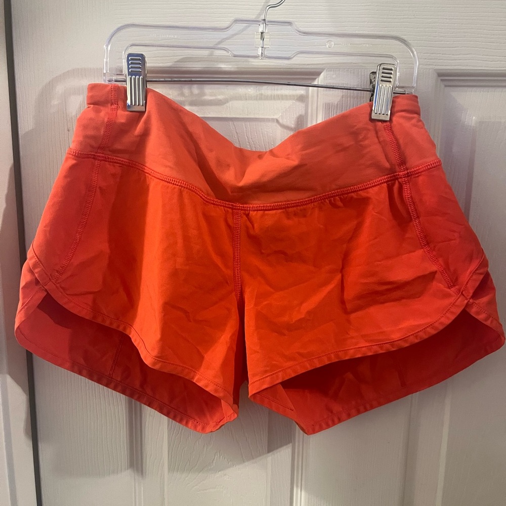 Lululemon Speed up short. Size 4. Vivid Flame (orange/red) color.